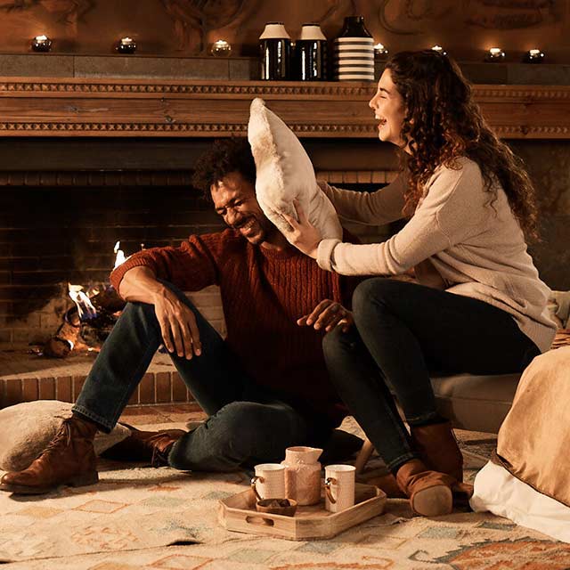 Couple playing in the living room